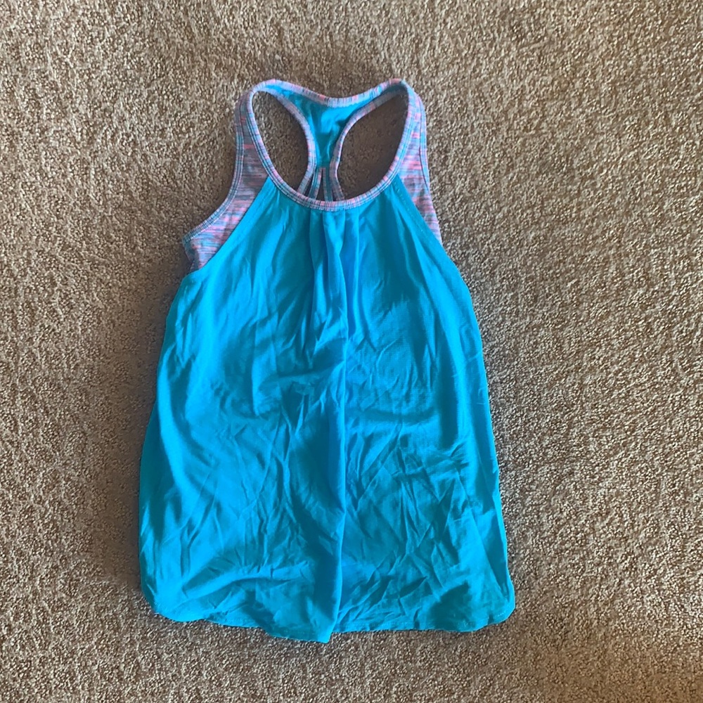 blue and pink ivivva athletic tank top